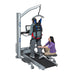 elderly man uses Biodex Rehab NxStep Unweighing System in combination with an inclined treadmill