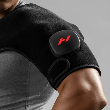 man wearing the Hyperice Venom 2 Shoulder Heat and Massage Wrap