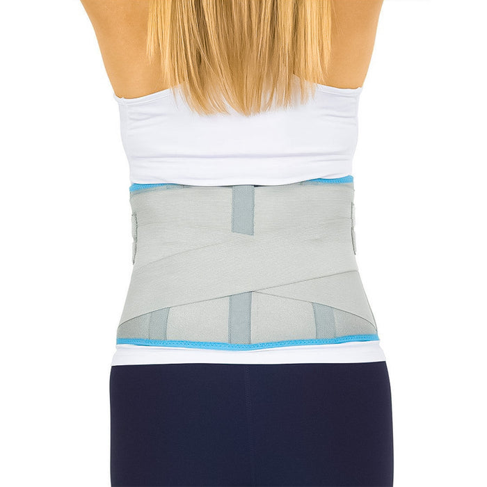 woman wearing the Vive Health Back Ice Wrap with her arms raised