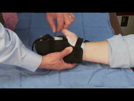 Orthopedic physical therapist demonstrates how to properly wear the Hely & Weber Xtender