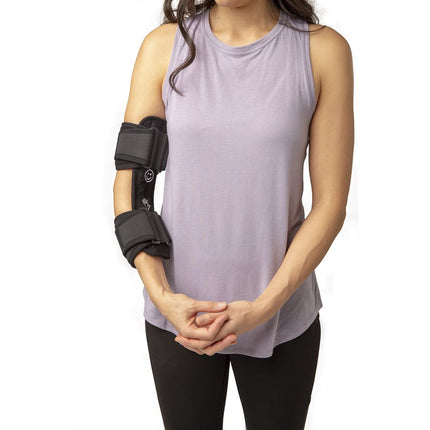 woman wearing the Hely & Weber Cubital Comfort Brace on her right arm