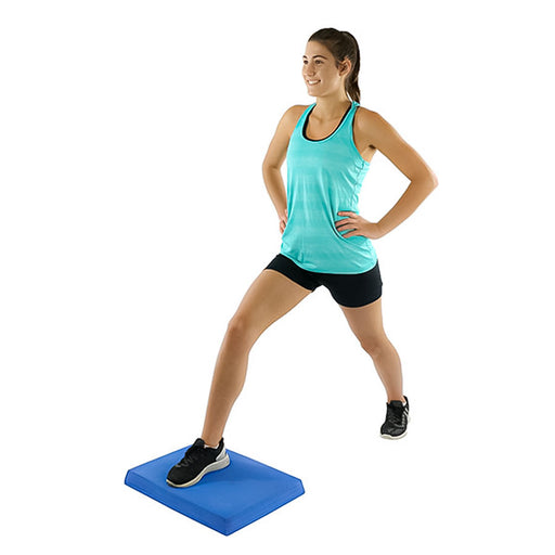 woman using CanDo Balance Pad for lunges