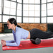 woman using CanDo Composite Foam Roller Extra-Firm for planks