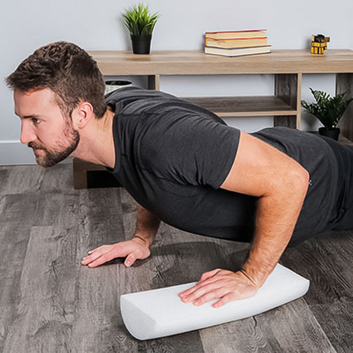 man using CanDo Half Round Foam Roll 36in for push-ups