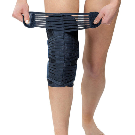 someone adjusting a M-Brace Vega Plus Patella Stabilizer