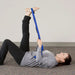 woman physical therapist using the RangeMaster StretchStrap to stretch her hamstrings